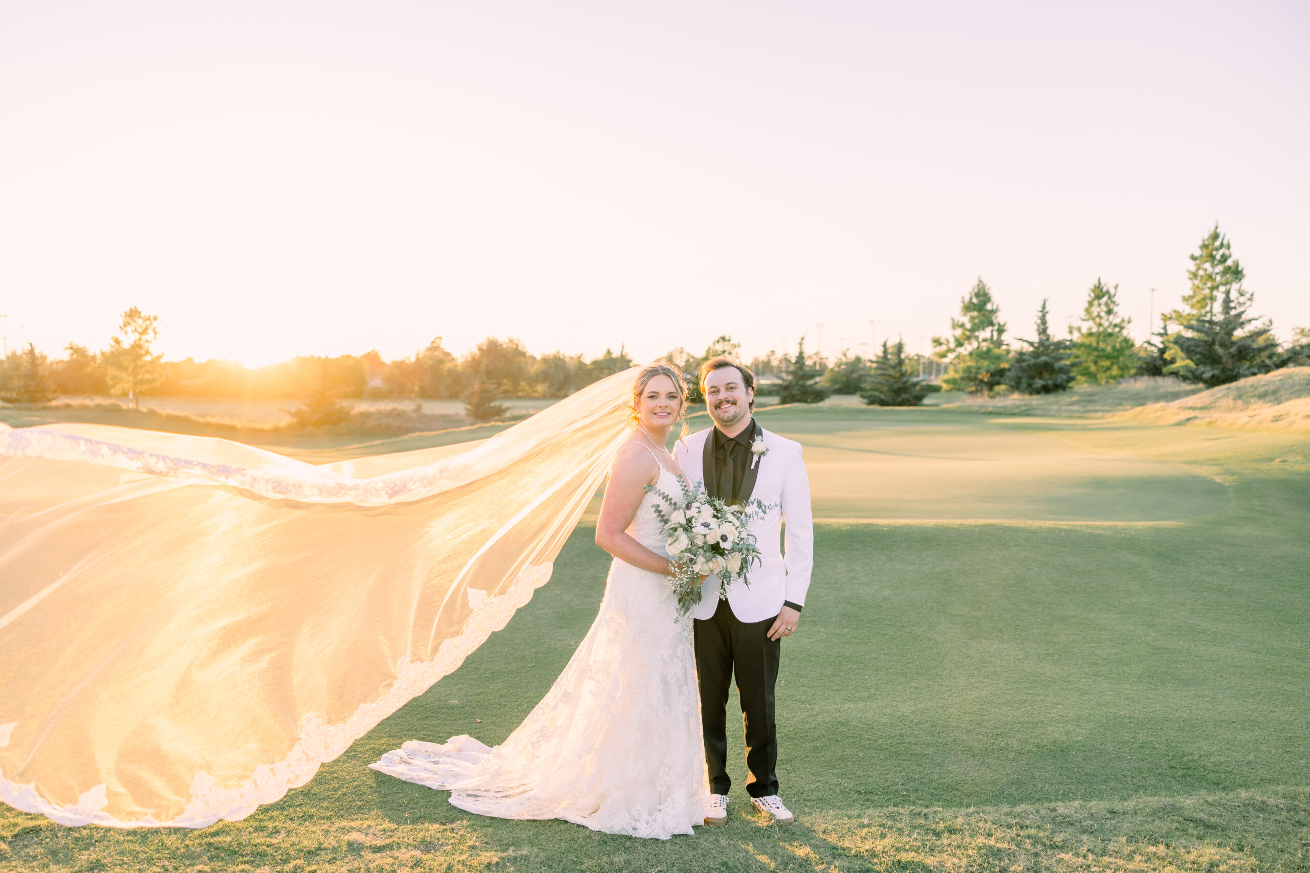 Jimmie Austin Golf Course wedding. Bride and Groom on golf course